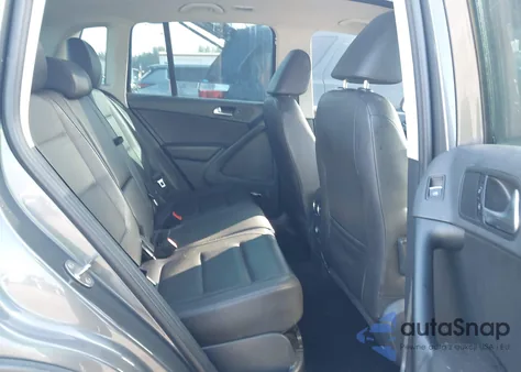 2014 Volkswagen Tiguan Sel z USA, uszkodzony, nr VIN WVGAV3AXXEW556304